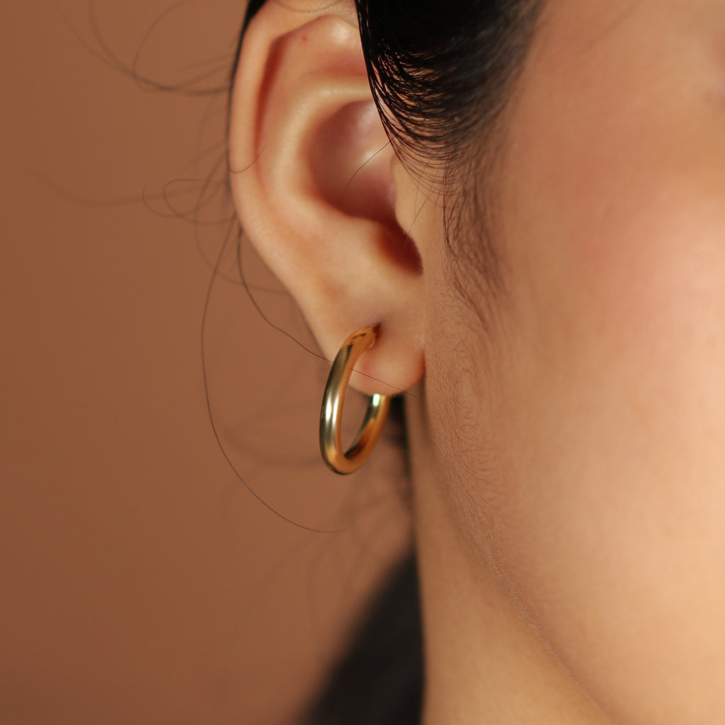 Tube Medium Hoops, Crafted from high-quality 18K gold