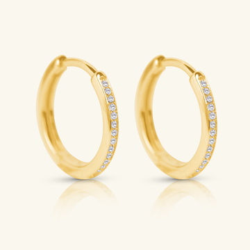 Channel Diamond Huggie Hoops, Made in 18k solid gold and set with natural diamonds.