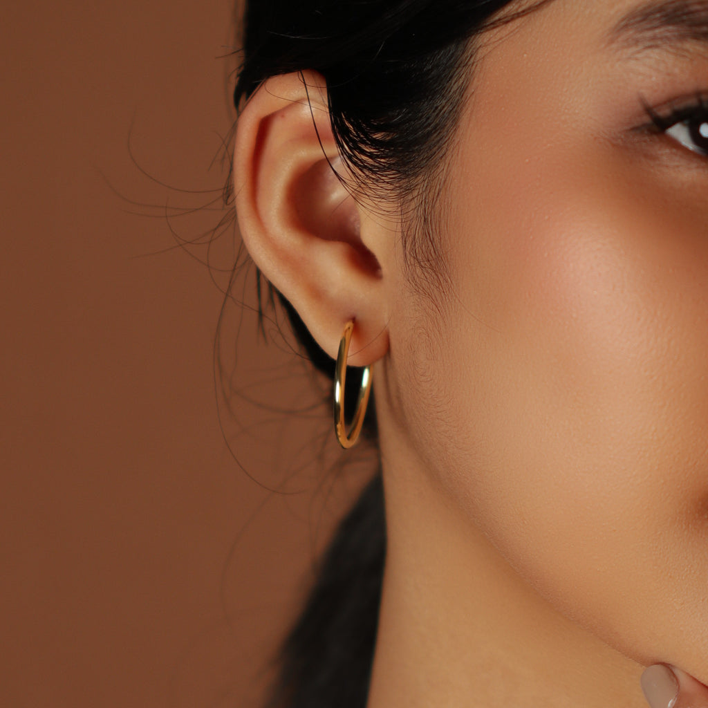 Small Easy Hoops, Made in 18k hallowed gold.