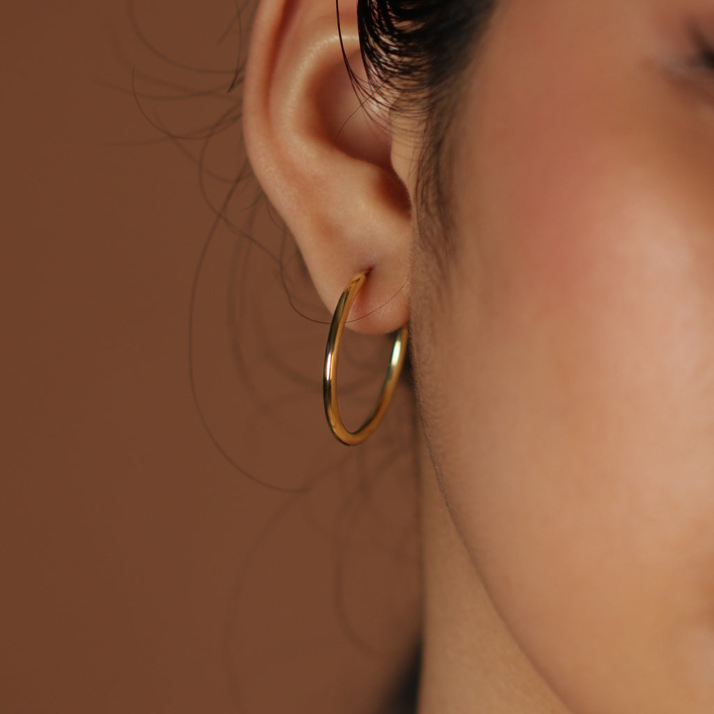 Large Easy Hoops, Made in 18k hallowed gold.