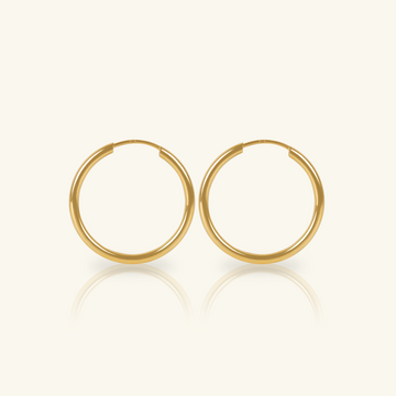 Small Easy Hoops, Made in 18k hallowed gold.